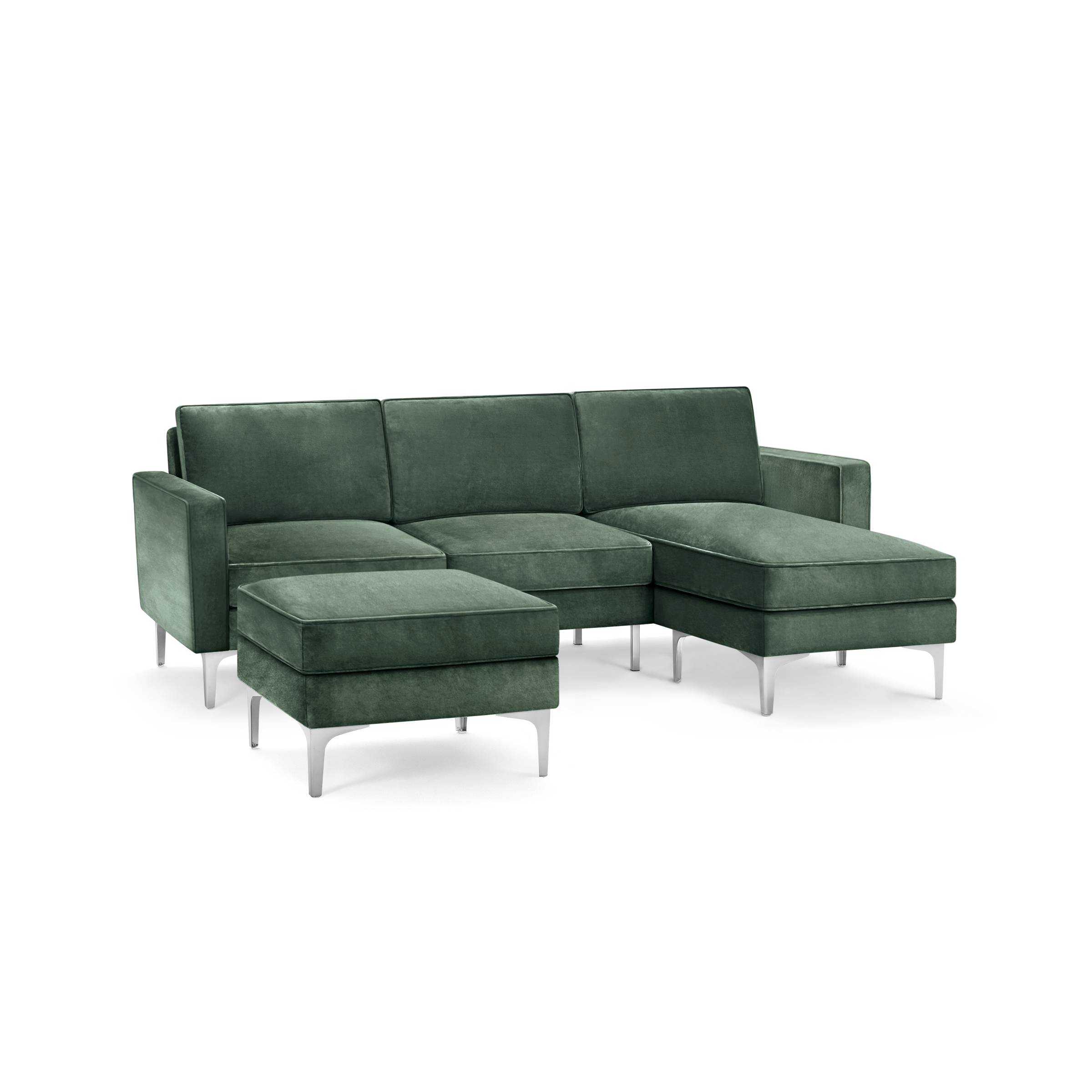 modern green velvet sectional sofa with matching ottoman, featuring sleek metal legs and sleek design on the right side