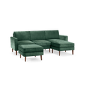 modern l - shaped sectional sofa with green velvet upholstery, wooden legs, and matching ottoman, designed for comfort and relaxation