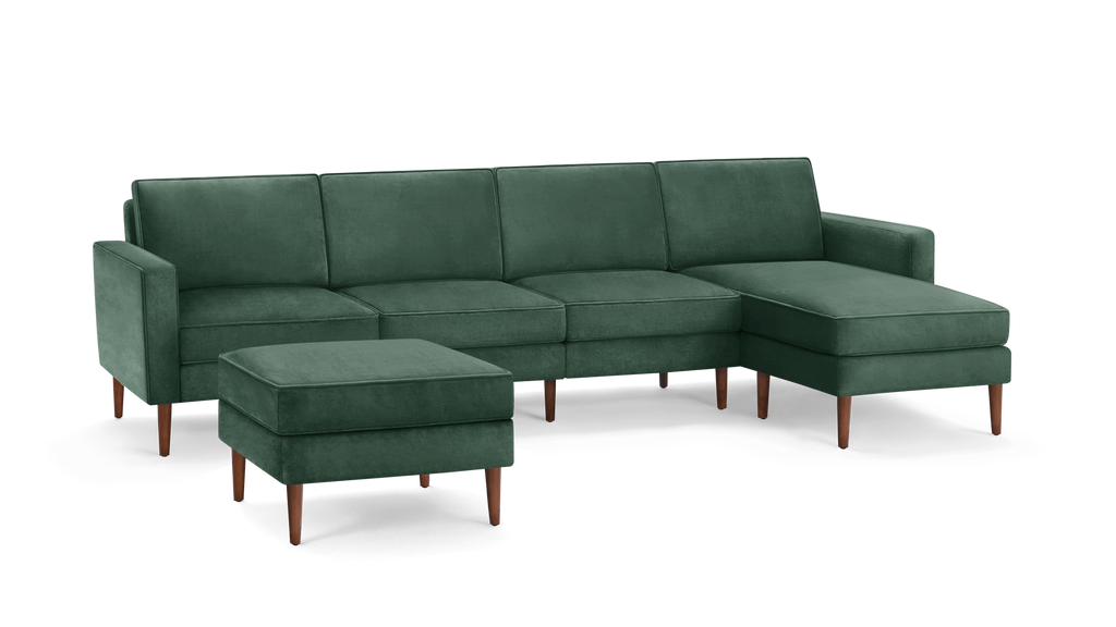modern green velvet sectional sofa with matching ottoman, featuring wooden legs and matching cushions, featuring a clean, minimalist design