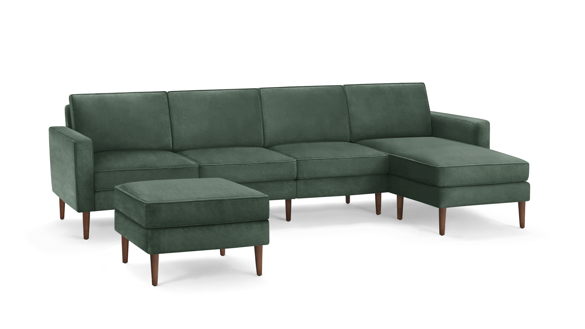 modern green velvet sectional sofa with matching ottoman, featuring wooden legs and matching cushions, featuring a clean, minimalist design
