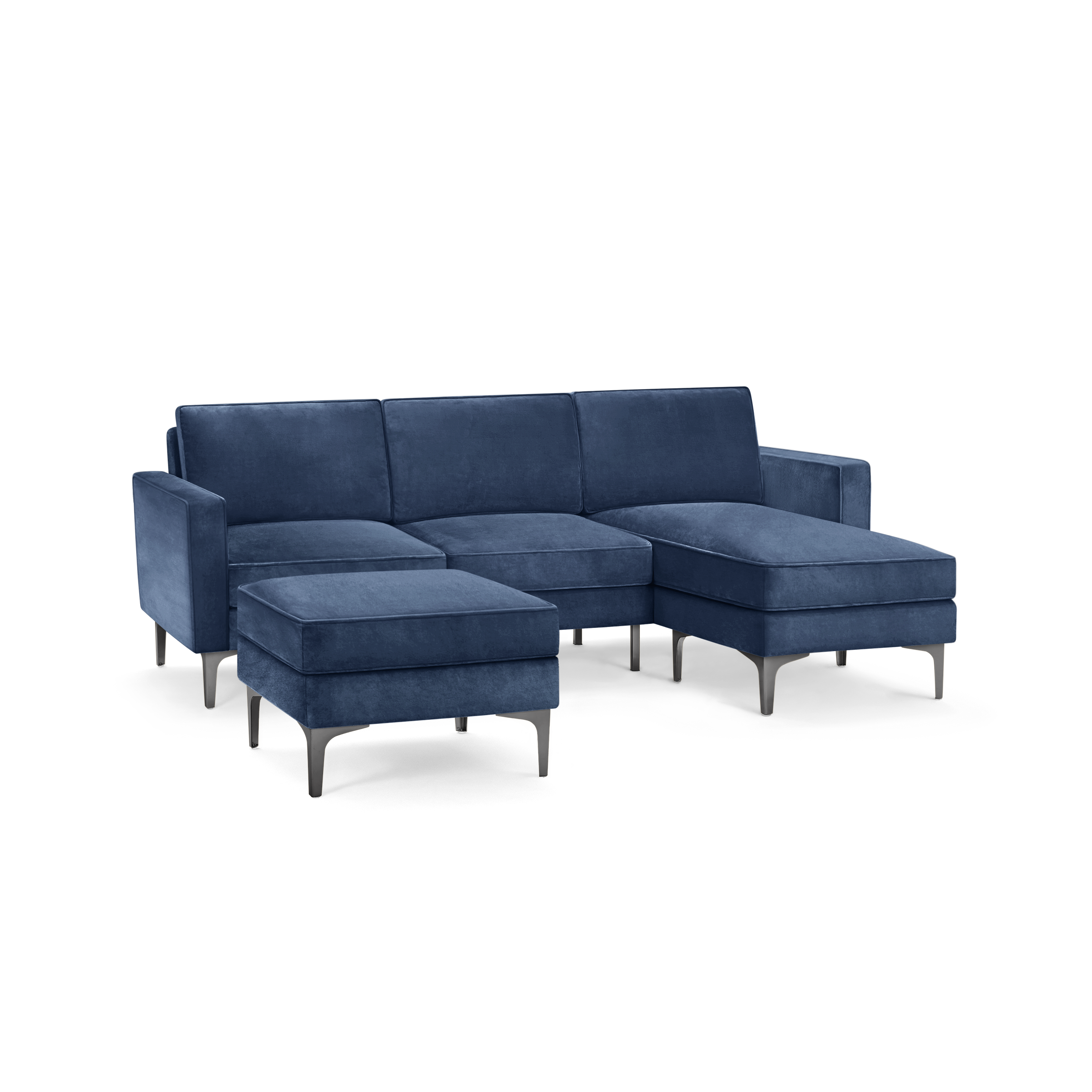 modern blue velvet sectional sofa with chaise lounge and matching ottoman, featuring sleek metal legs and sleek design