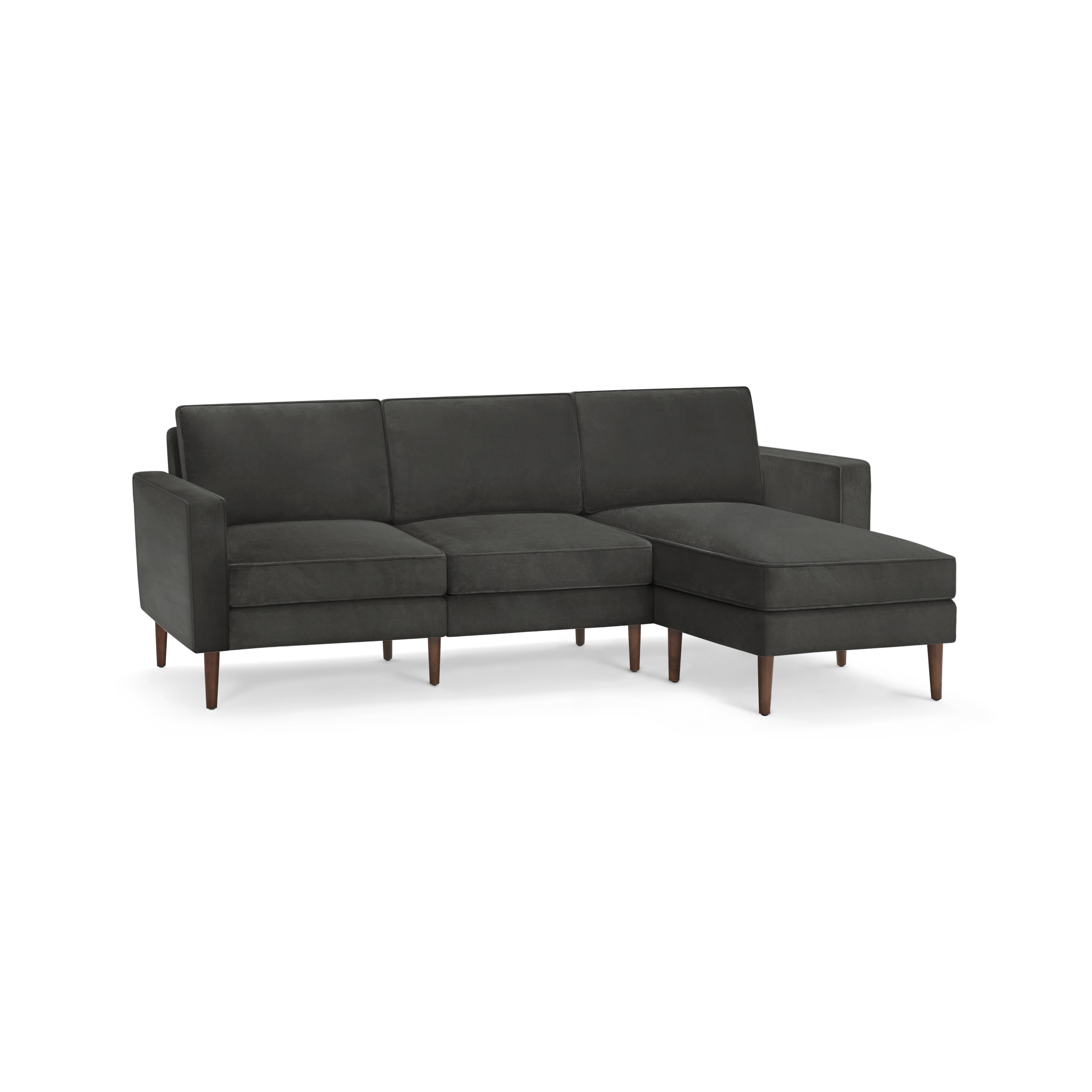 modern dark gray l - shaped sectional sofa with wooden legs and clean lines on the back, featuring a chaise lounge and matching ottoman