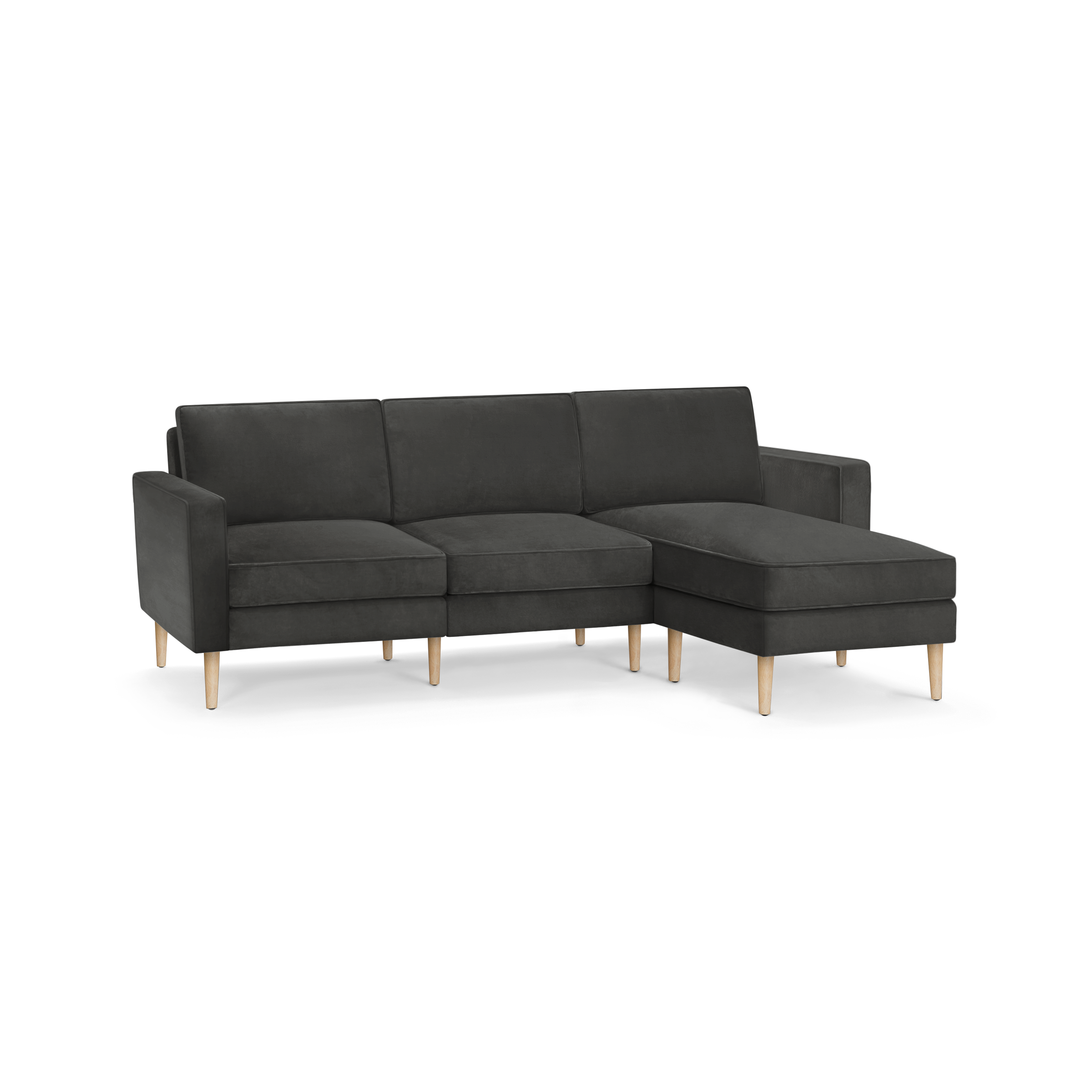 modern dark gray l - shaped sectional sofa with wooden legs and clean lines on the back, featuring a chaise lounge and matching ottoman