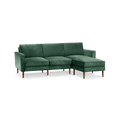 modern l - shaped sectional sofa with green velvet upholstery, tapered wooden legs, and clean lines on the back, designed for