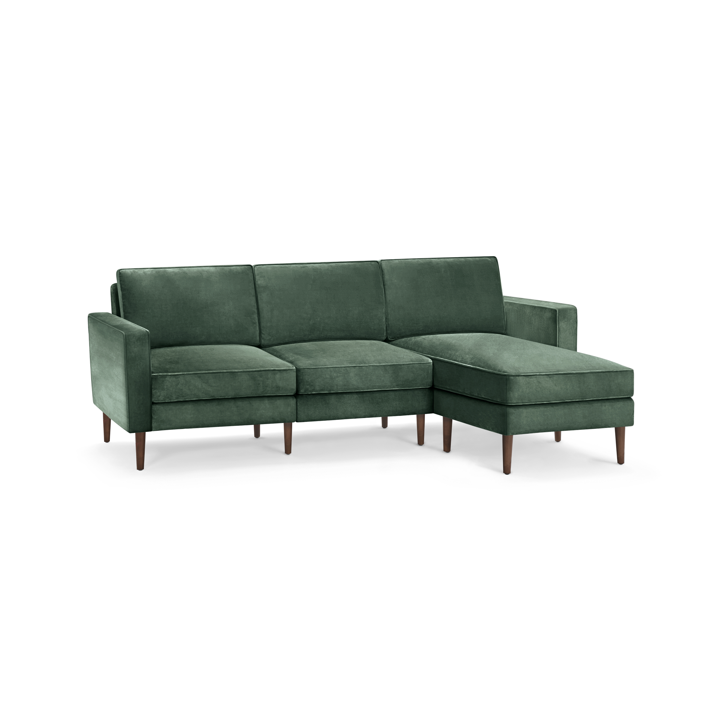 modern l - shaped sectional sofa with green velvet upholstery, tapered wooden legs, and clean lines on the back, designed for