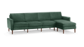 modern green velvet sectional sofa with wooden legs and matching ottoman, featuring a clean, minimalist design