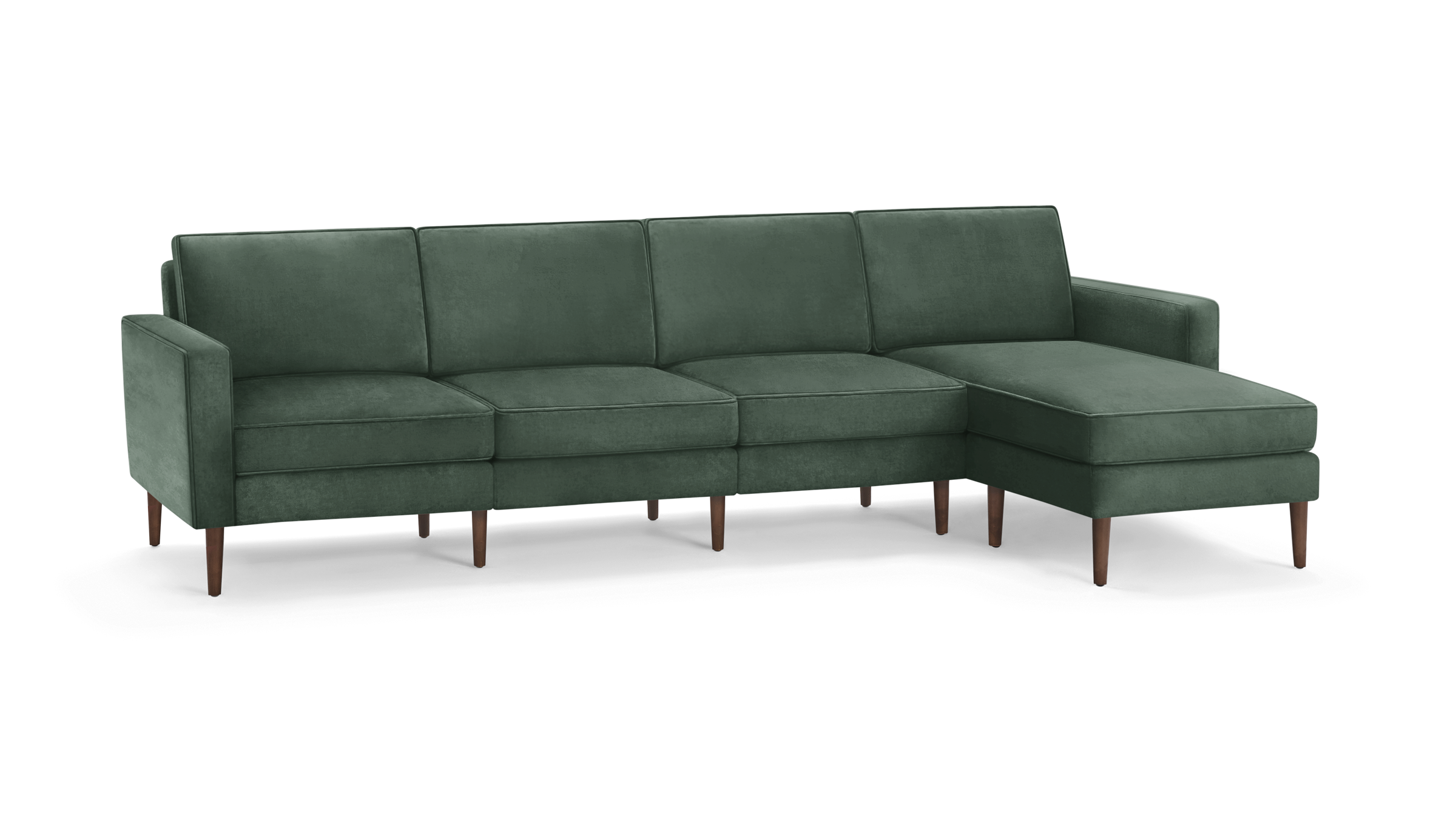 modern green velvet sectional sofa with wooden legs and matching ottoman, featuring a clean, minimalist design