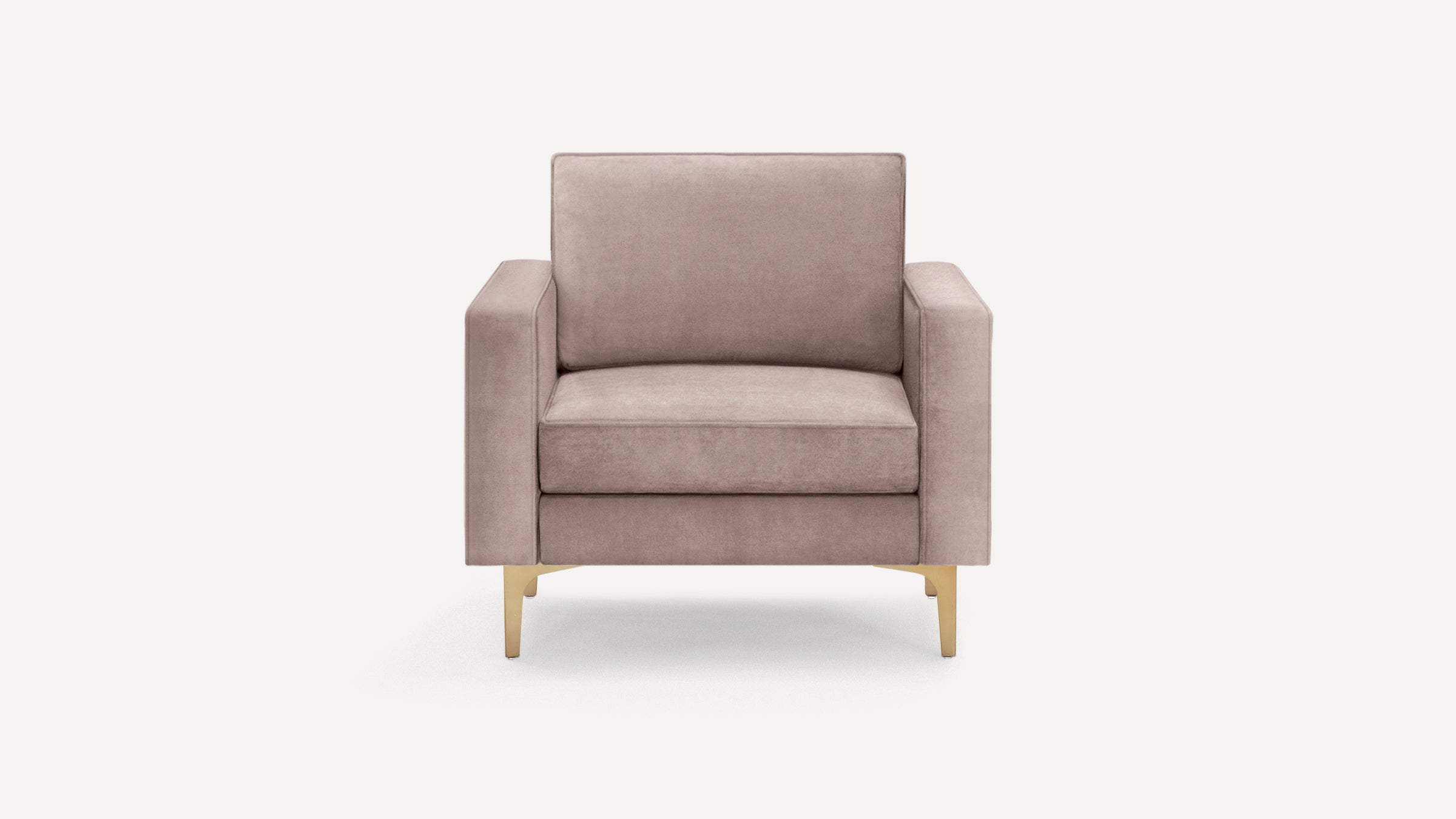 Modern single-seater armchair with soft mauve upholstery and gold metal legs, featuring wide armrests and cushioned backrest.