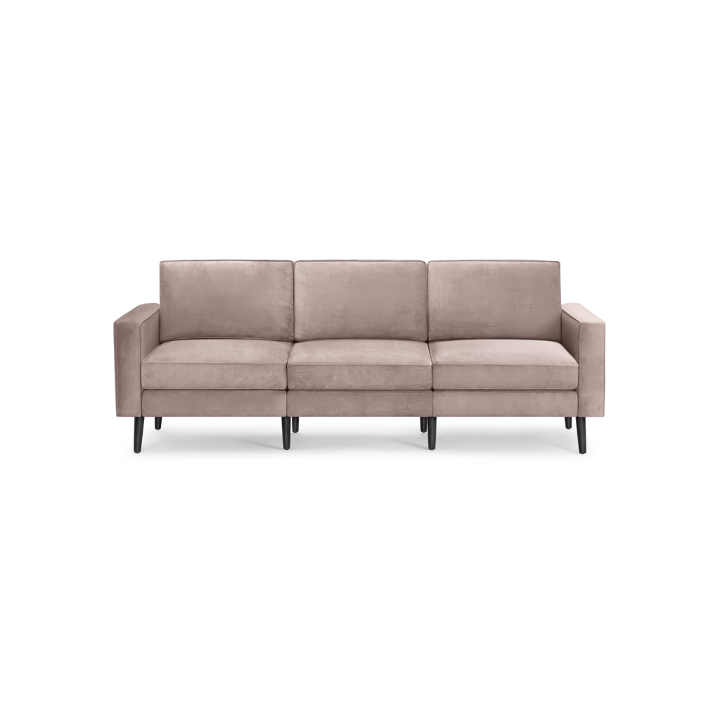 modern beige velvet sofa with black legs and a sleek design