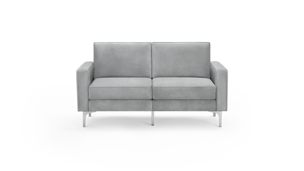 modern gray velvet loveseat with tapered armrests and tapered backrests, featuring a sleek design and sleek lines