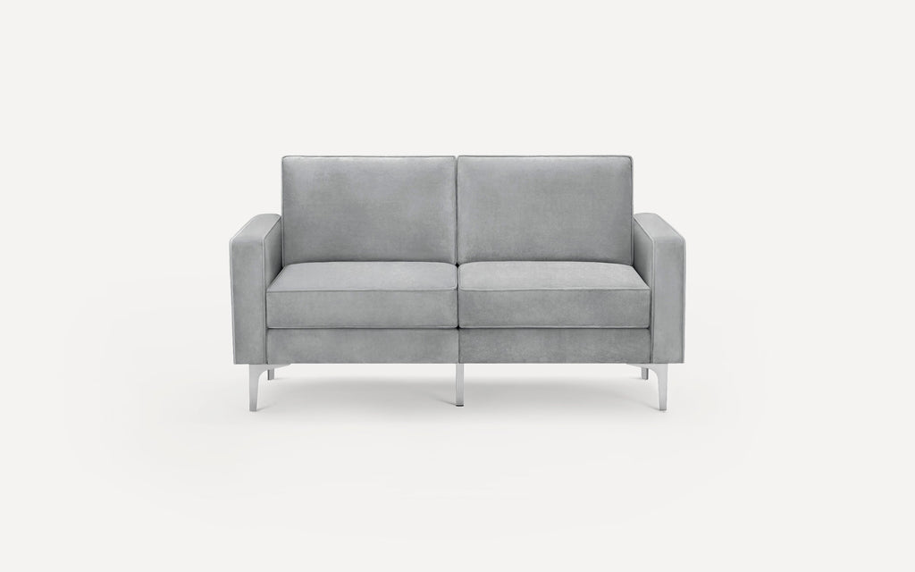 Modern light gray two-seater sofa with clean lines, cushioned seats, and metal legs on a plain white background.