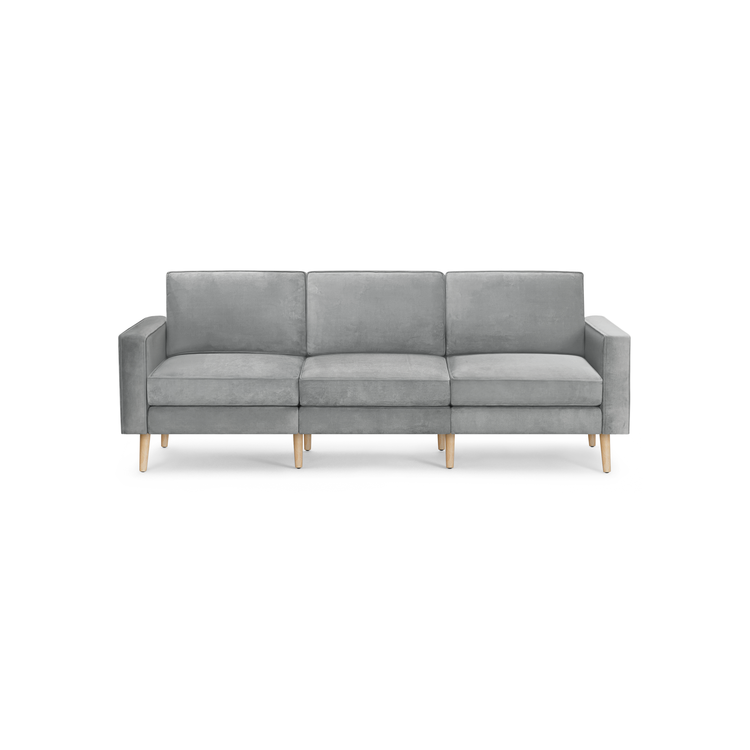 modern light gray velvet sofa with wooden legs and back cushions, featuring a three - cushioned sofa with clean lines and clean lines