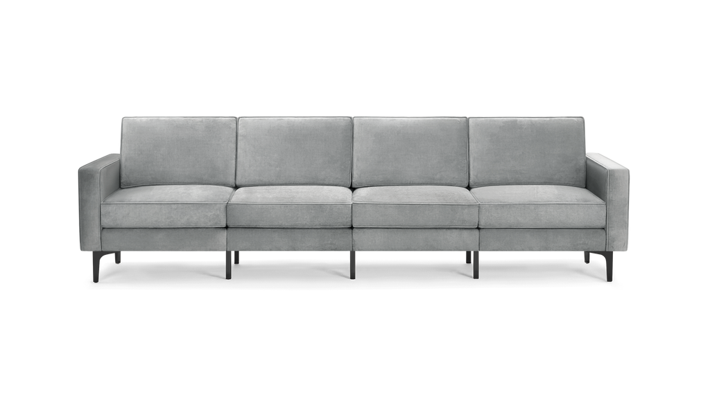 modern gray velvet sofa with black legs and a sleek backrest