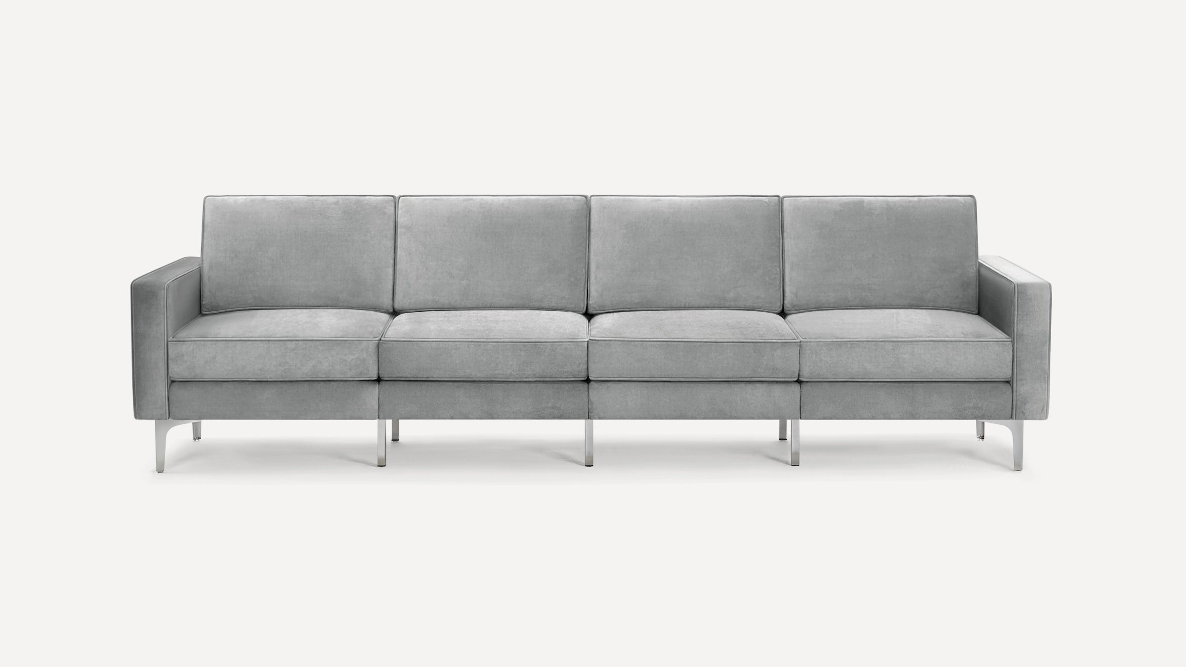 Modern gray fabric four-seater sofa with square cushions, metal legs, and straight armrests on a white background.