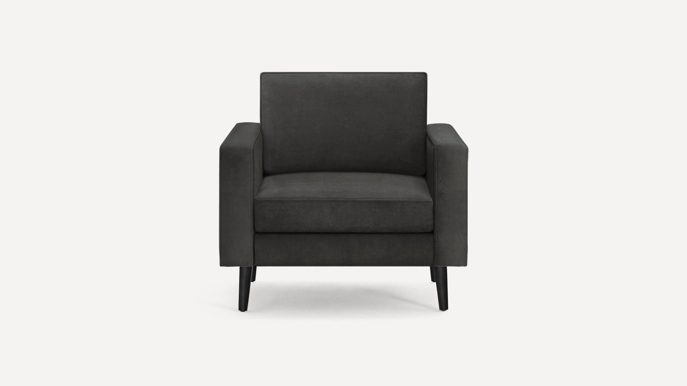 Modern black armchair with clean lines, cushioned seat and backrest, and slender tapered legs, shown from front view.