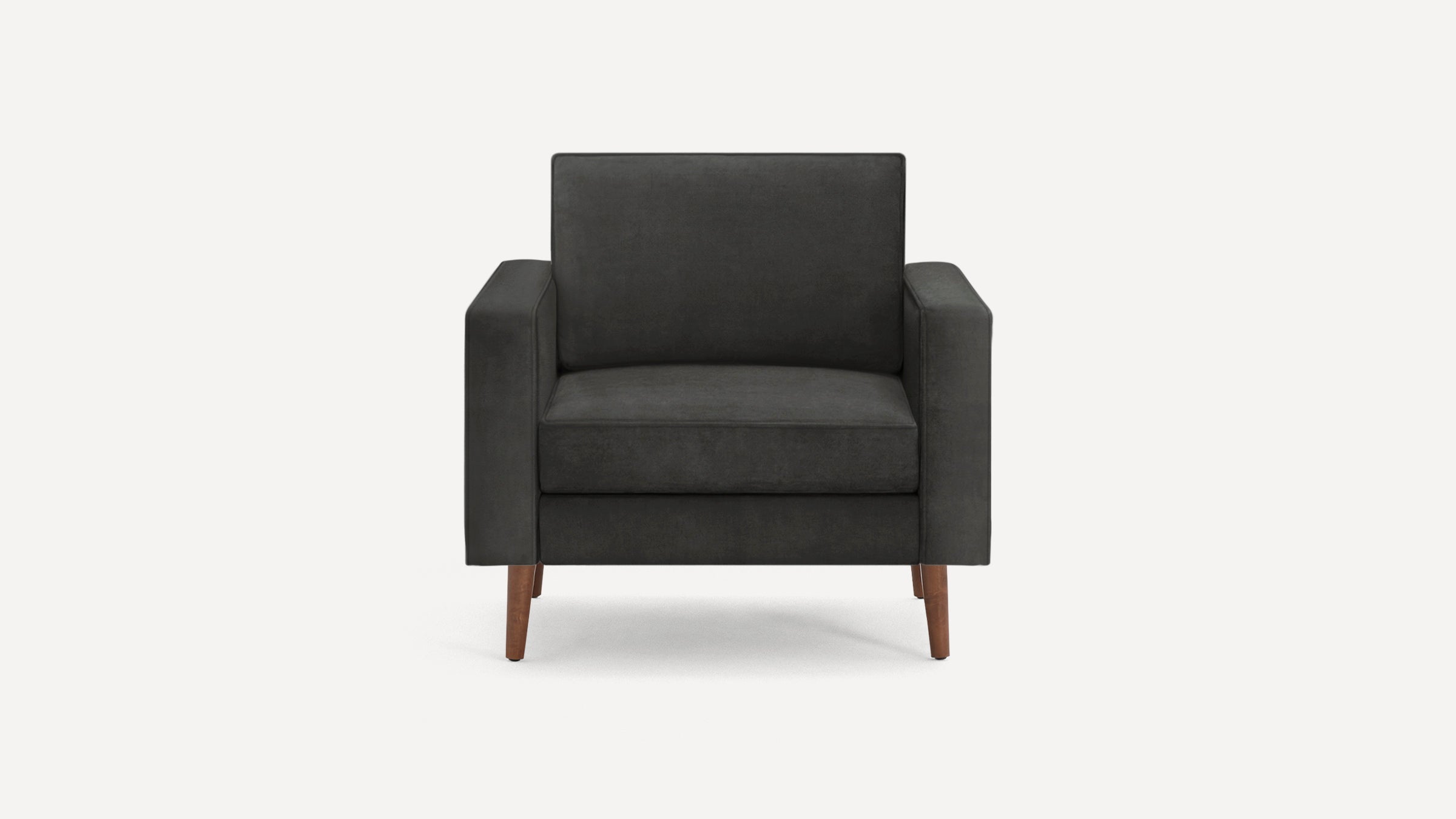 Front view of a modern dark gray upholstered armchair with wooden tapered legs and square armrests.