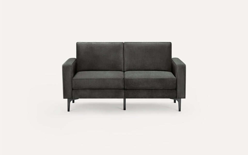 Modern dark gray two-seater sofa with clean lines, cushioned seats, straight armrests, and slim black metal legs.