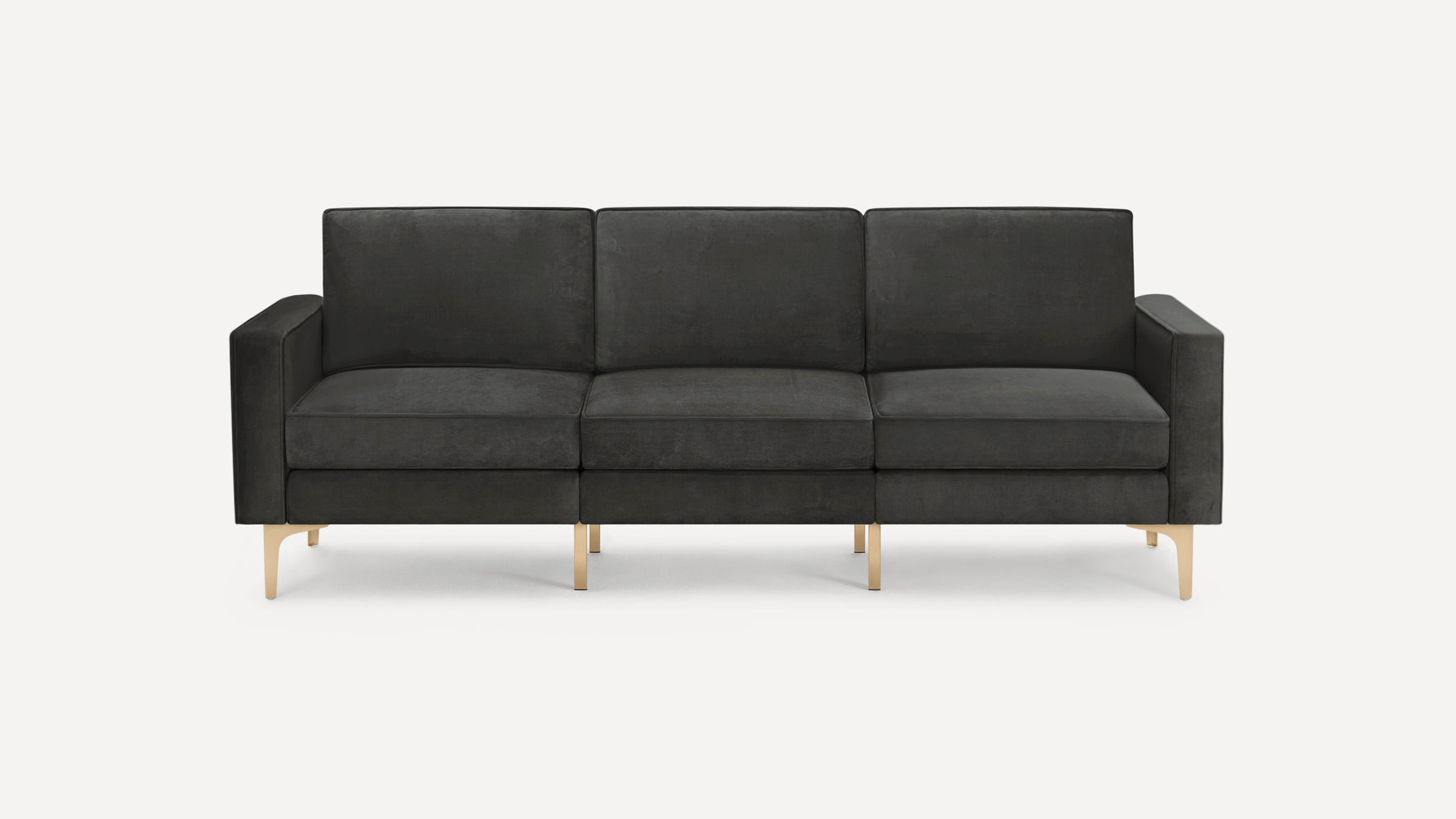Modern black three-seater sofa with plush cushions, straight armrests, and gold-colored metal legs on a white background.