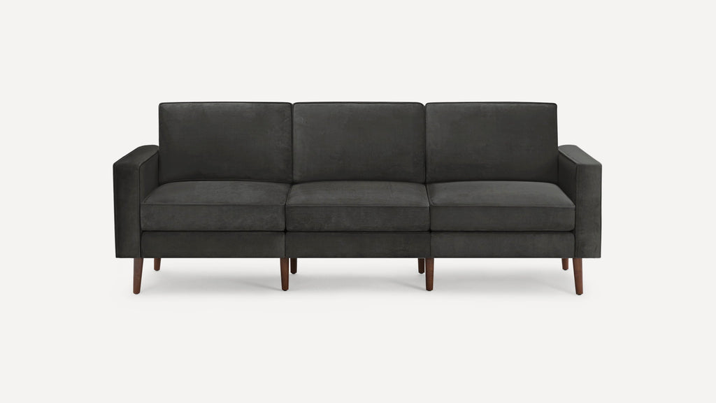 Modern three-seater dark gray sofa with square arms, cushioned seats, and wooden tapered legs on a white background.