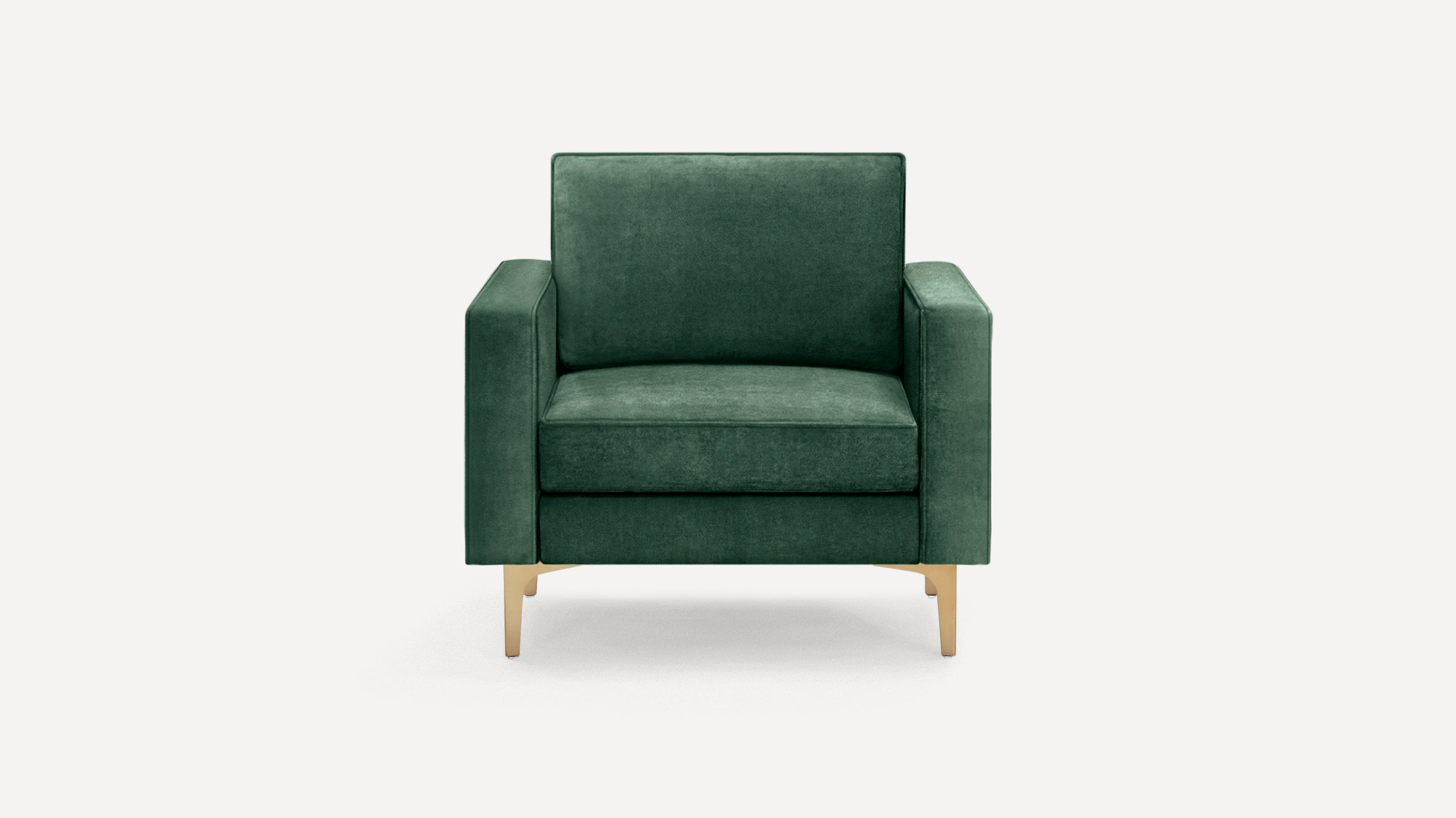 Dark green velvet armchair with square armrests and gold metal legs, shown against a plain white background.