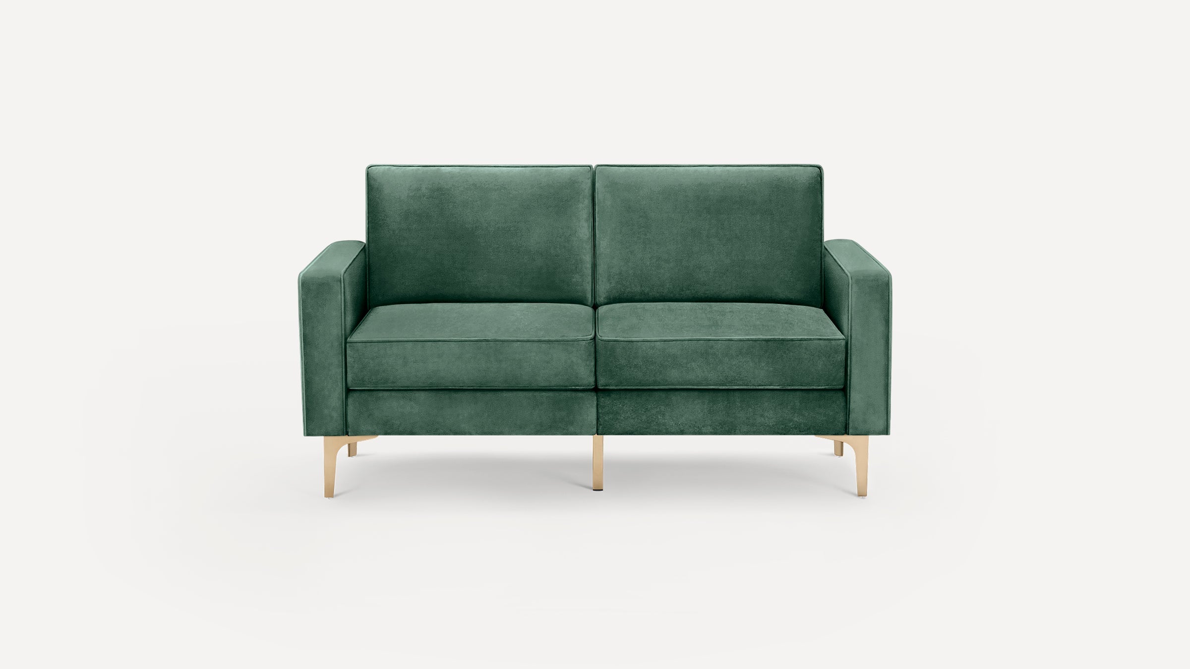 Green velvet two-seater sofa with square arms and slim gold metal legs, set against a plain white background.