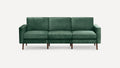 Three-seater green velvet sofa with clean lines, square arms, and mid-century style wooden legs.