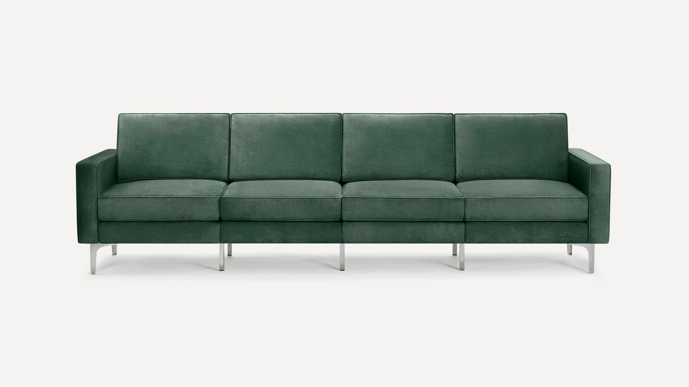 Modern four-seater sofa in dark green velvet upholstery with slim metal legs and clean, straight armrests.