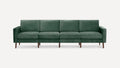 Modern four-seater sofa with dark green velvet upholstery and slim wooden legs, featuring clean lines and square armrests.