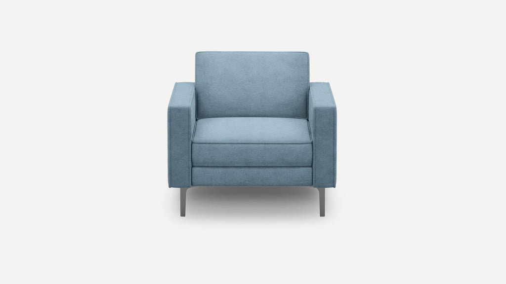 Front view of a modern, light blue upholstered armchair with straight armrests and slim metal legs.