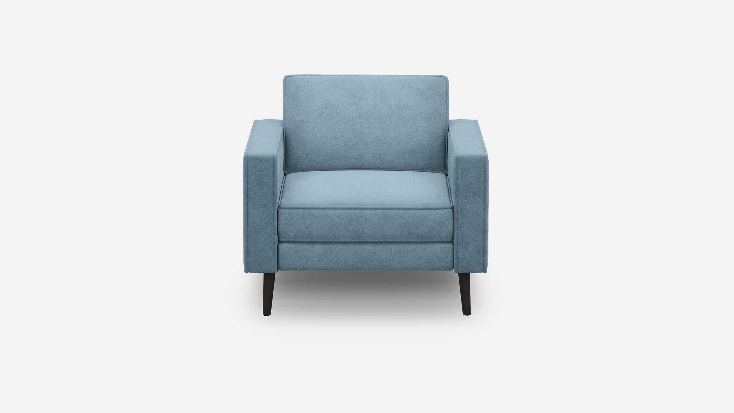 Front view of a modern light blue upholstered armchair with straight armrests and dark wooden legs on a white background.