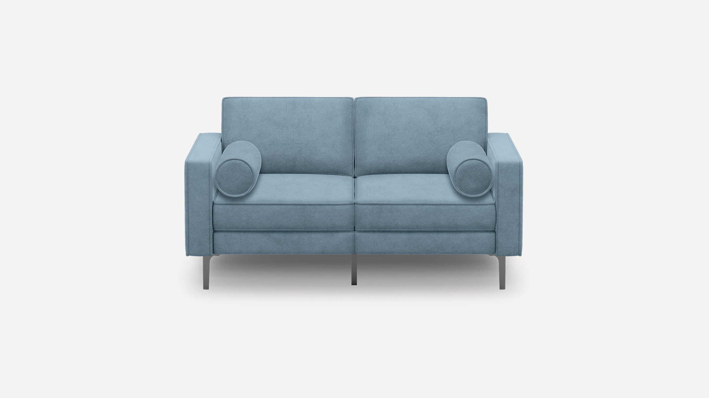 Modern light blue two-seater sofa with clean lines, metal legs, and two matching round bolster pillows on each side.