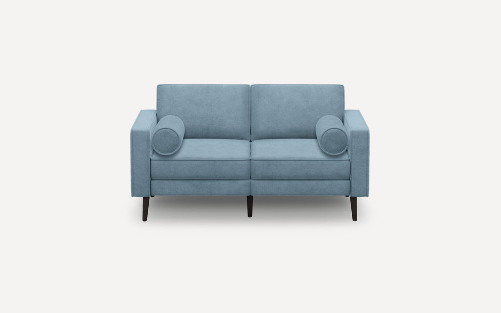 Modern light blue two-seater sofa with straight armrests, two round bolster pillows, and four black tapered wooden legs.