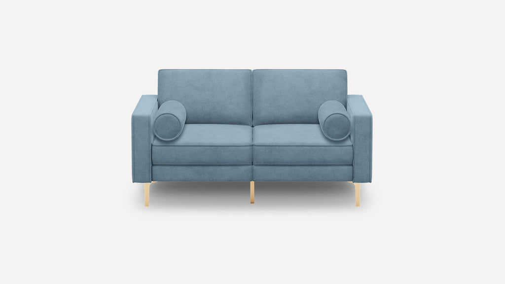 Light blue modern two-seater sofa with cylindrical cushions and slim gold metal legs on a white background.