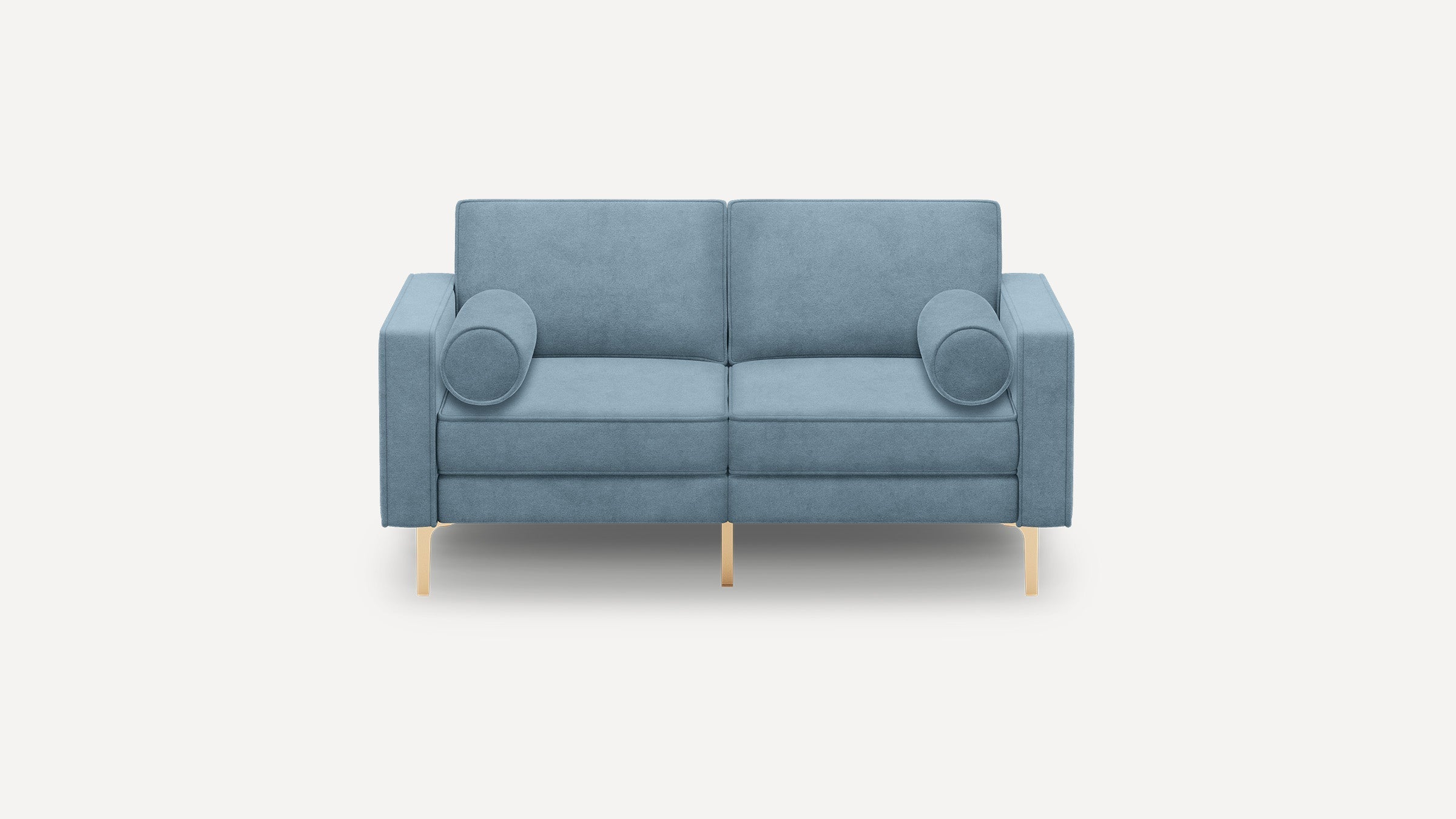 Light blue modern two-seater sofa with cylindrical cushions and slim gold metal legs on a white background.