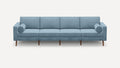 modern light blue fabric sofa with wooden legs and rounded cushions on a white background