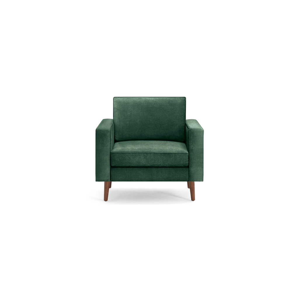 modern green velvet armchair with wooden legs and backrests, featuring a sleek, modern design