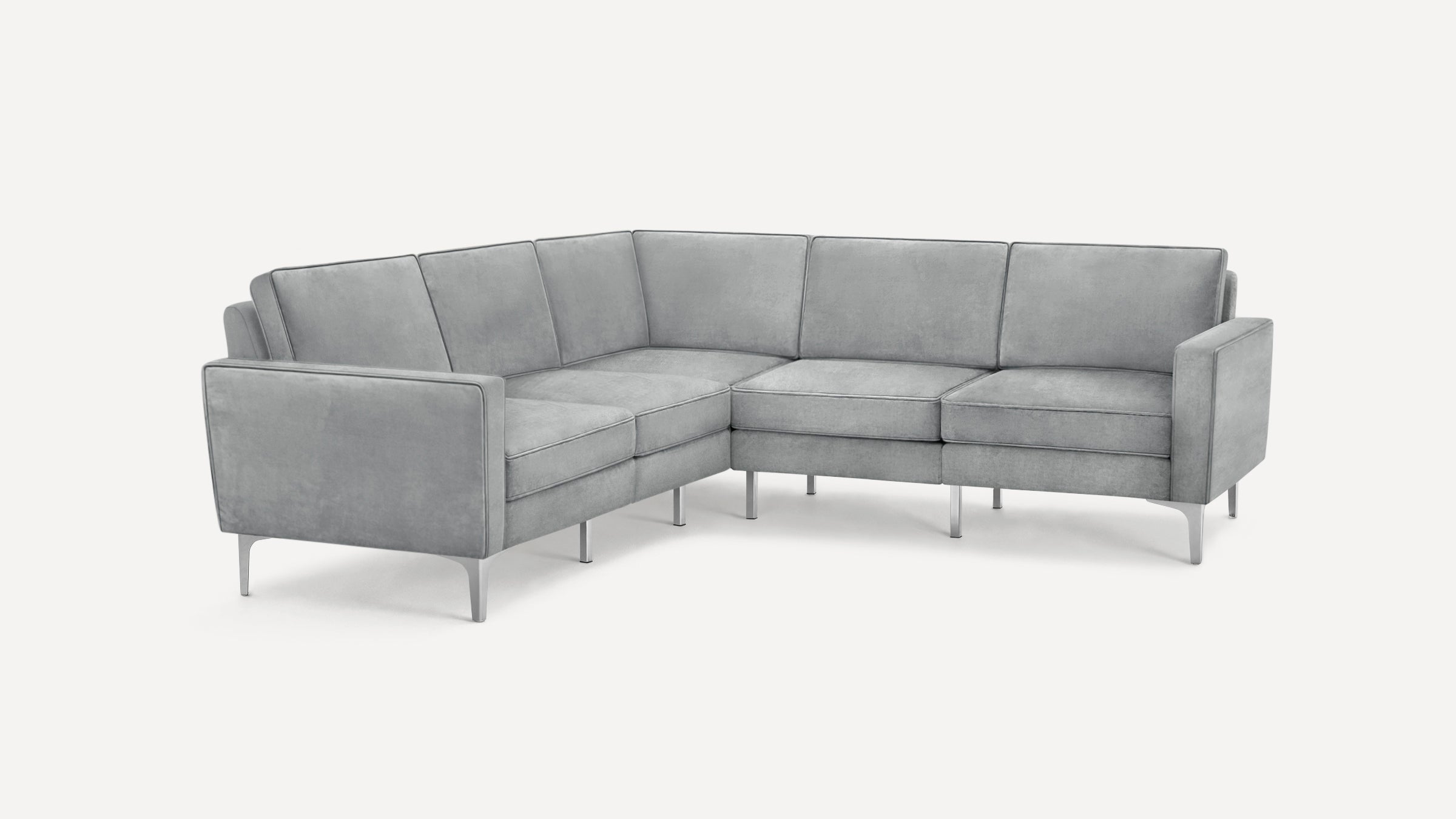 Modern light gray fabric sectional sofa with clean lines, metal legs, and plush cushions, designed for corner seating.