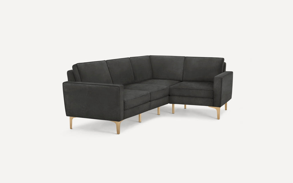 Modern dark gray sectional sofa with clean lines, thin armrests, and light wooden legs on a white background.