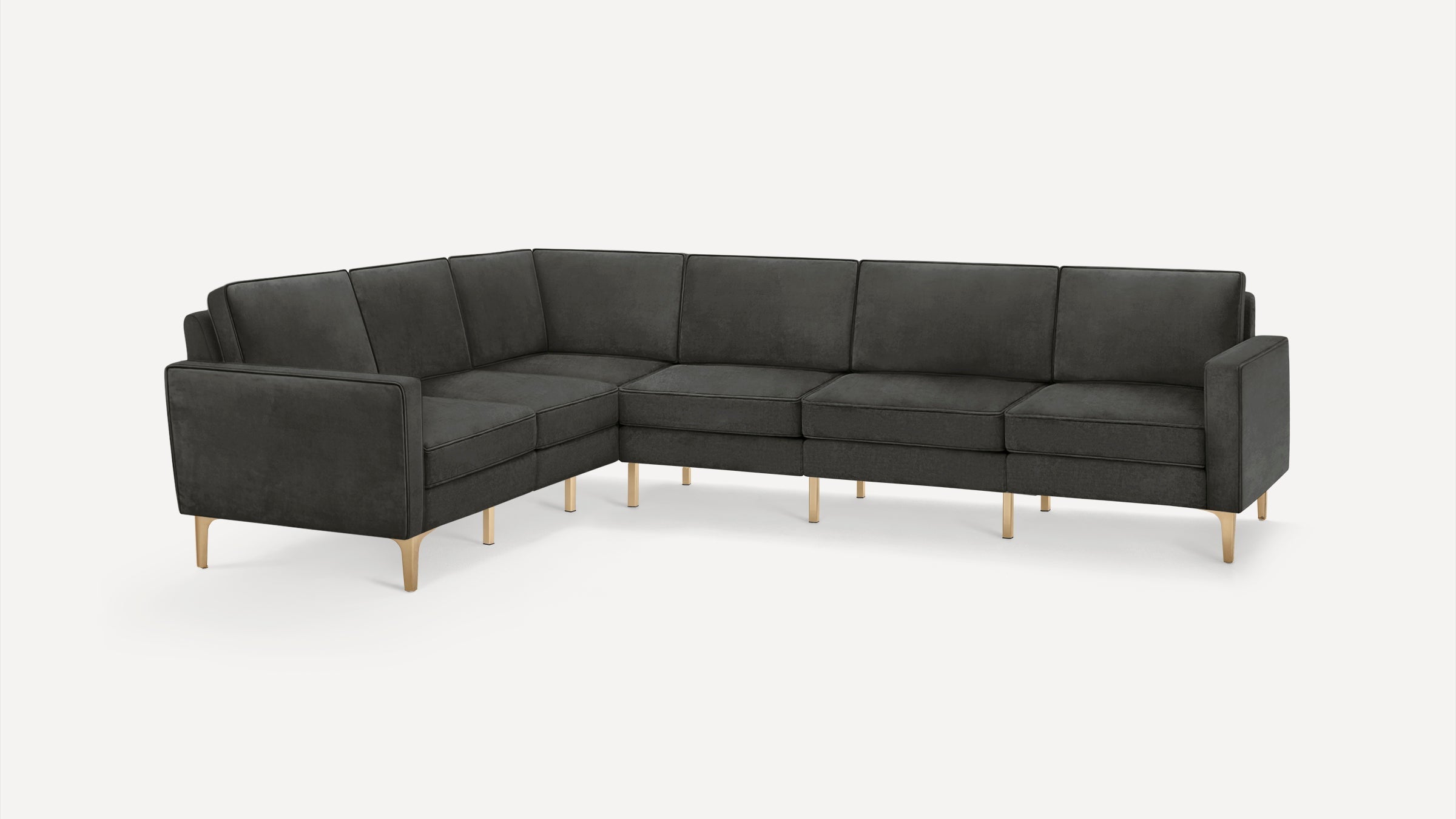 Dark gray L-shaped sectional sofa with clean lines, cushioned seats, backrests, and light wooden legs.