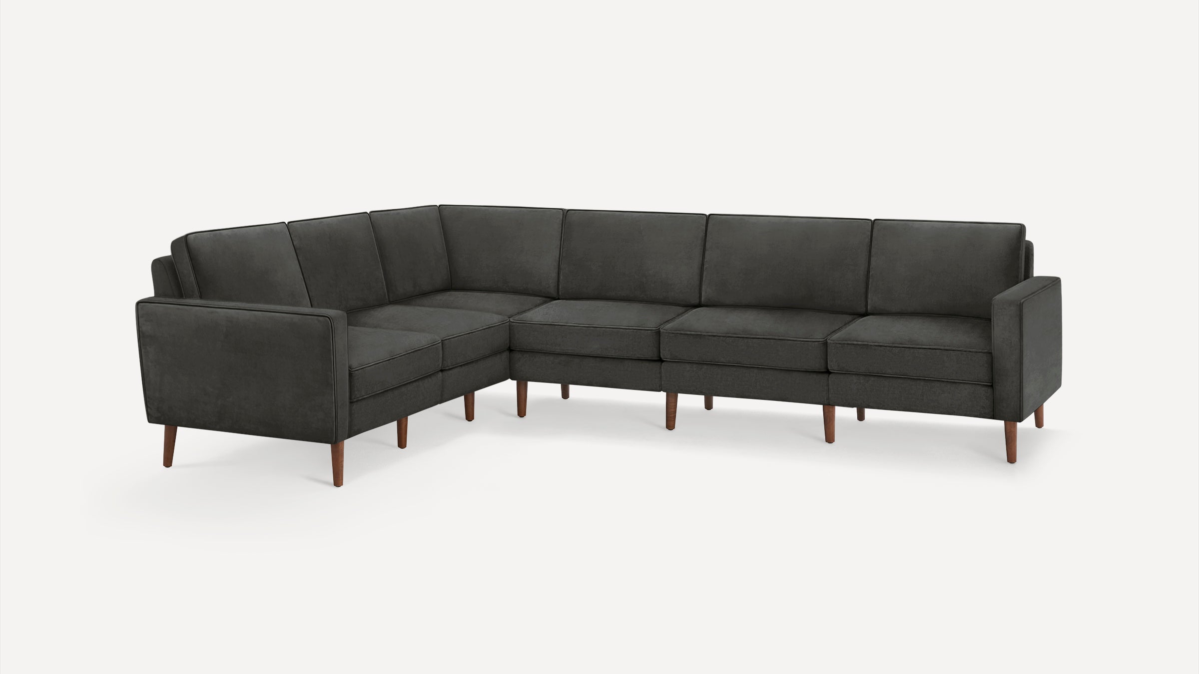 Dark gray modern L-shaped sectional sofa with wooden tapered legs and clean, straight armrests.