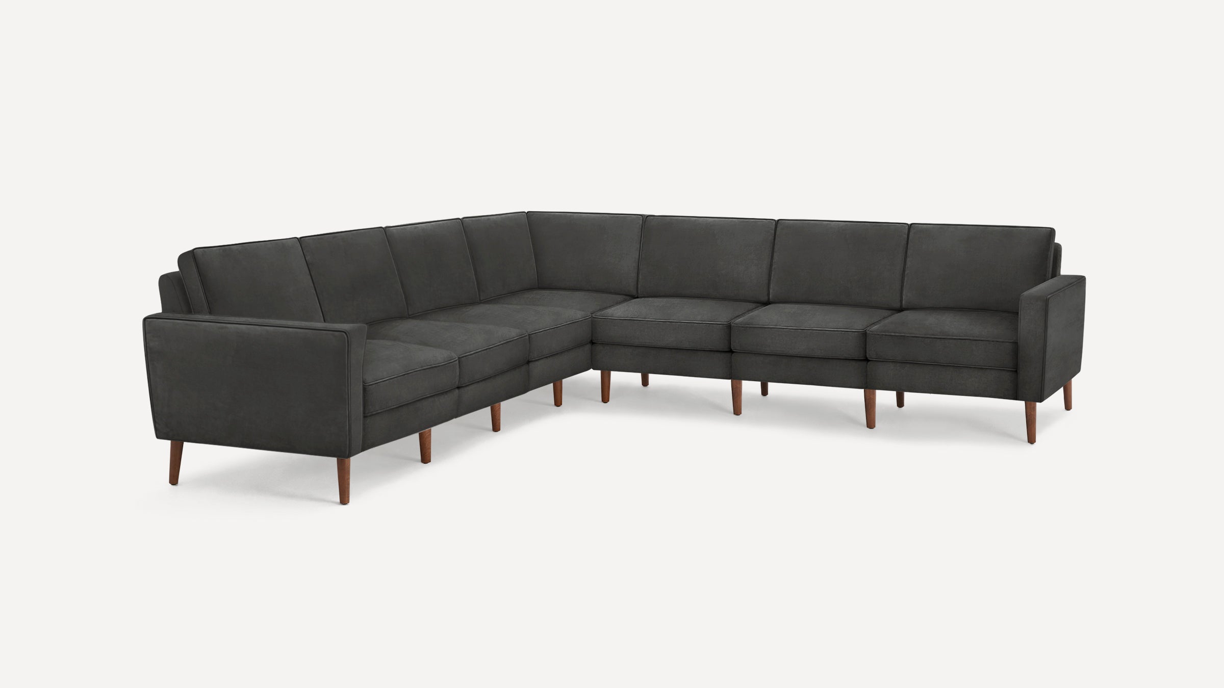 Dark gray L-shaped sectional sofa with clean lines, wooden legs, and padded back and seat cushions.