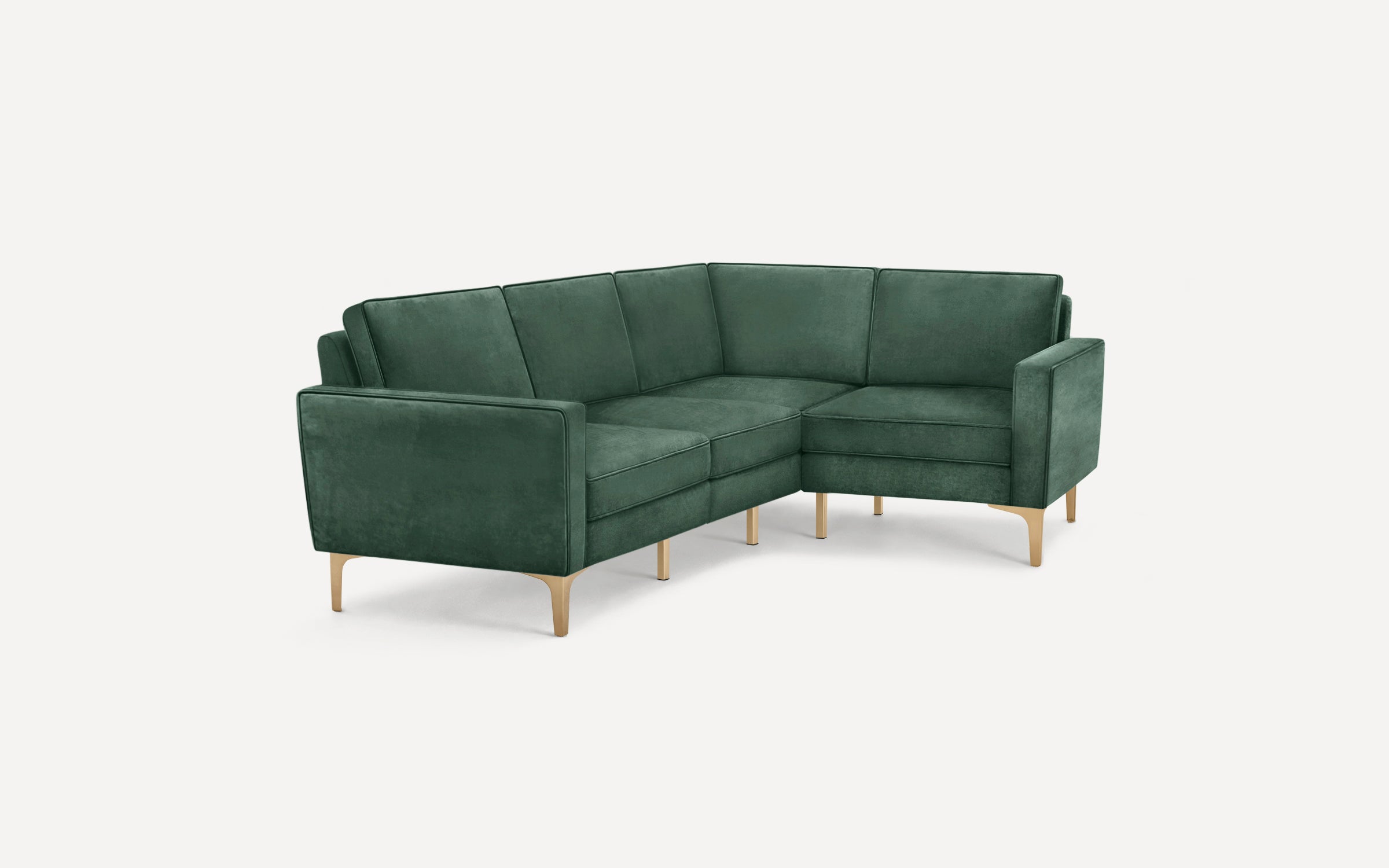 Green velvet L-shaped sectional sofa with clean lines and gold metal legs on a white background.