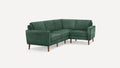 modern green velvet sectional sofa with wooden legs and clean lines on a white background