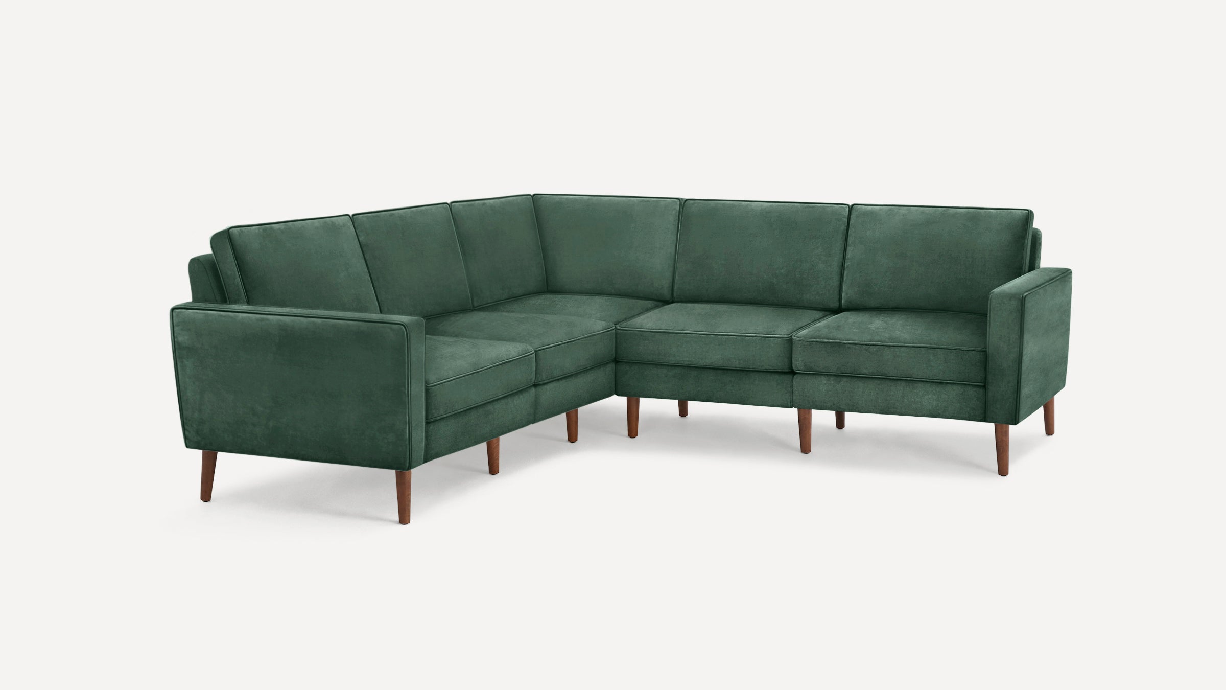 Green fabric L-shaped sectional sofa with clean lines, wooden tapered legs, and cushioned seats and backs.