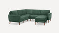 Dark green velvet L-shaped sectional sofa with wooden legs, featuring a modern, minimalist design and separate cushioned seats and backrests.
