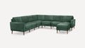 Modern L-shaped sectional sofa upholstered in dark green velvet fabric with wooden legs and clean, boxy cushions.