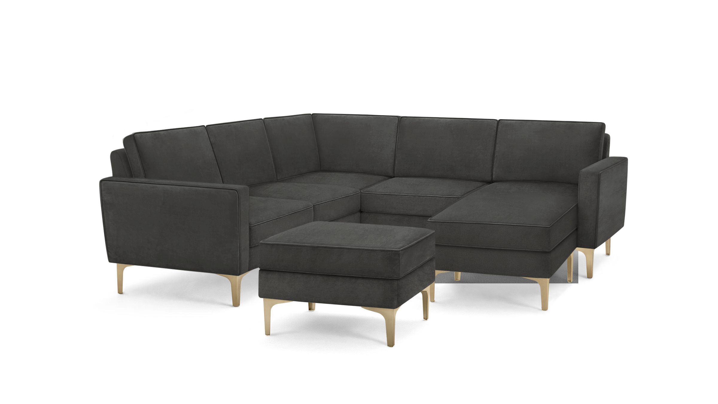 modern dark gray sectional sofa with gold legs and matching ottoman, featuring a sleek design and clean lines