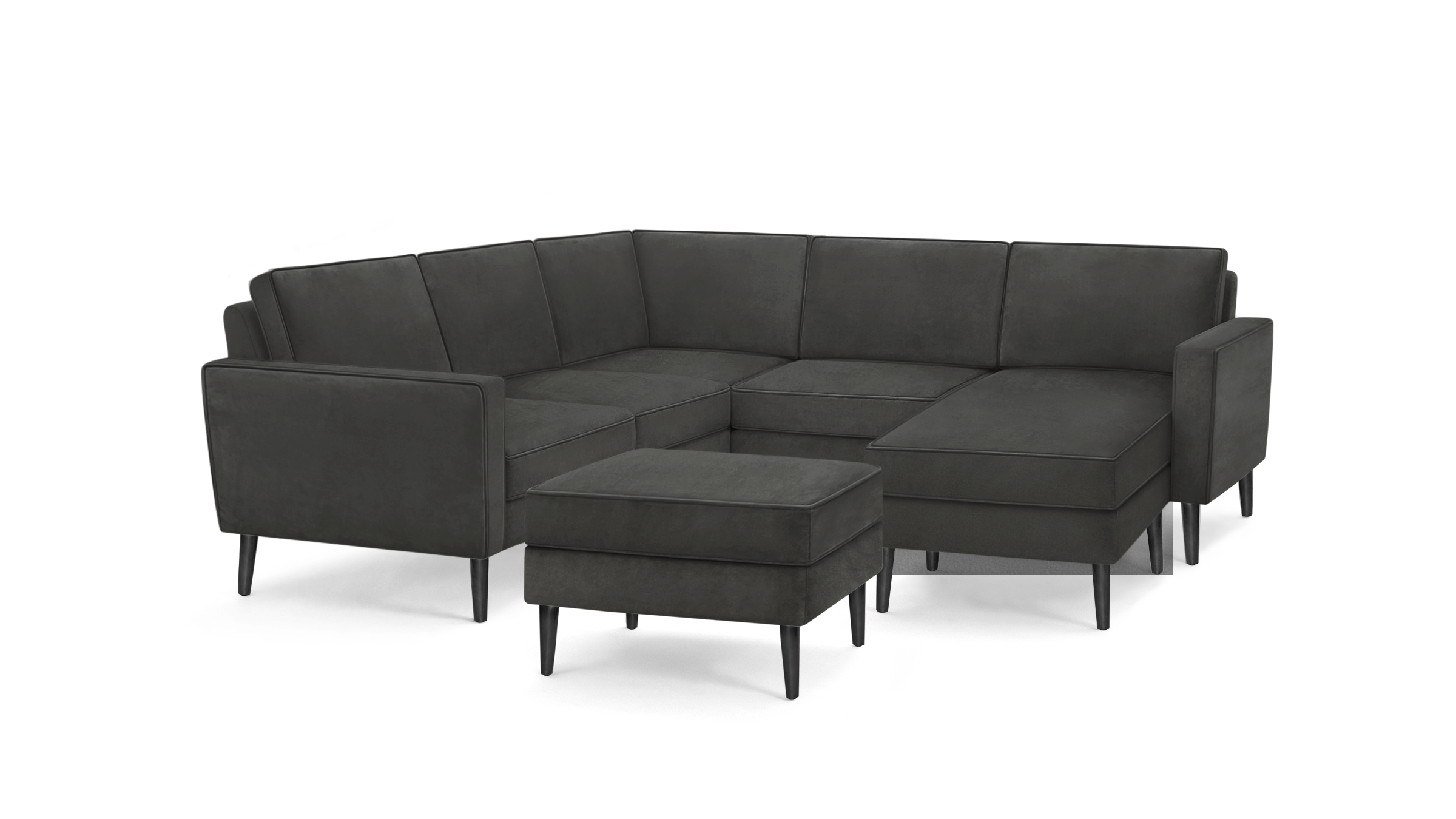 modern dark gray sectional sofa with matching ottoman, featuring sleek lines and sleek lines, featuring a sleek design and sleek lines