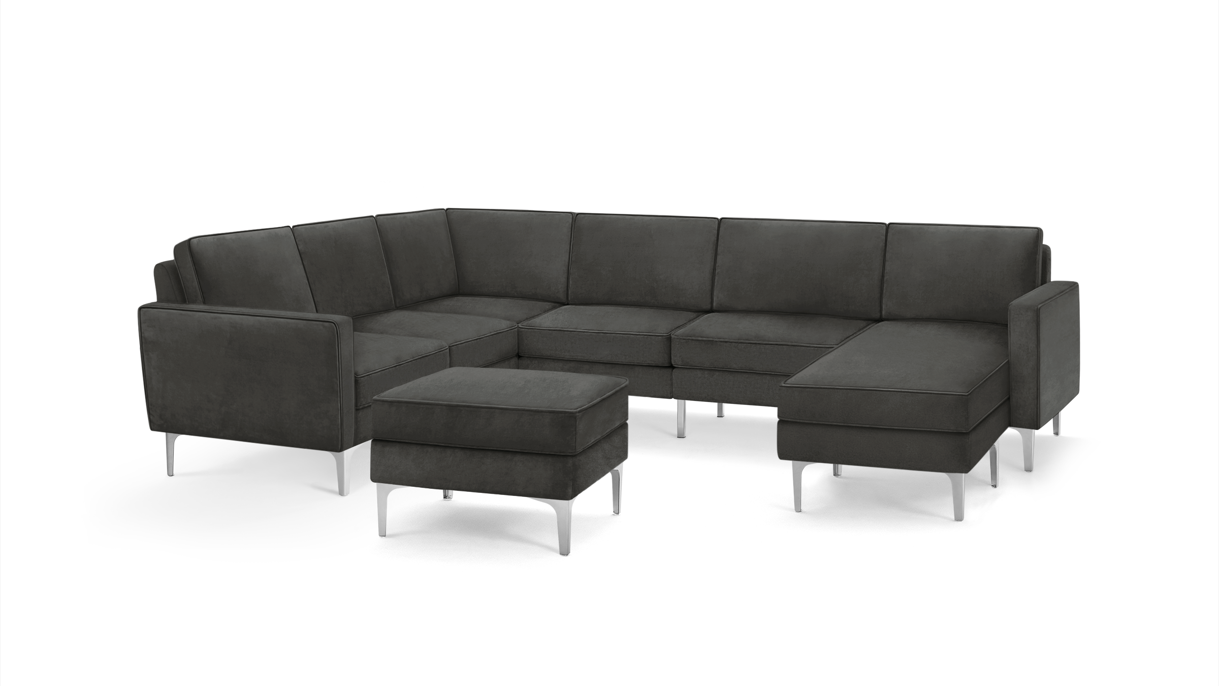 modern dark gray velvet sectional sofa with matching ottoman, featuring sleek metal legs and a sleek design