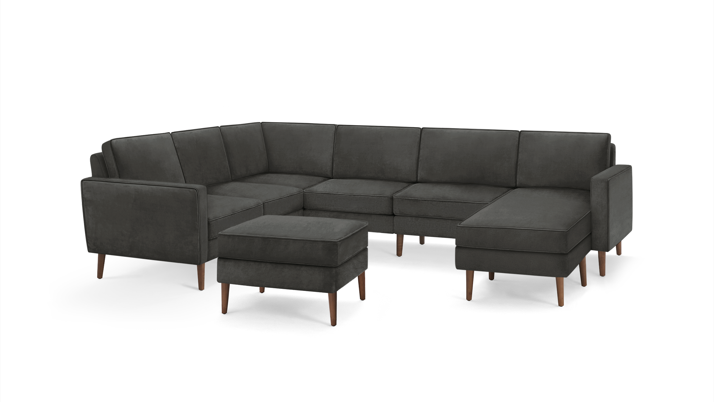 modern dark gray sectional sofa with wooden legs and matching ottoman, featuring a clean, minimalist design